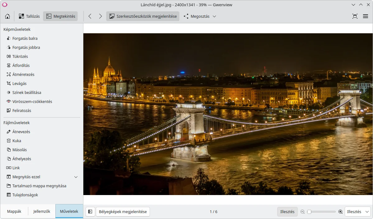 Gwenview képnézegető a budapesti Lánchíd éjszakai fotójával, oldalt a forgatás, tükrözés és levágás eszközeivel